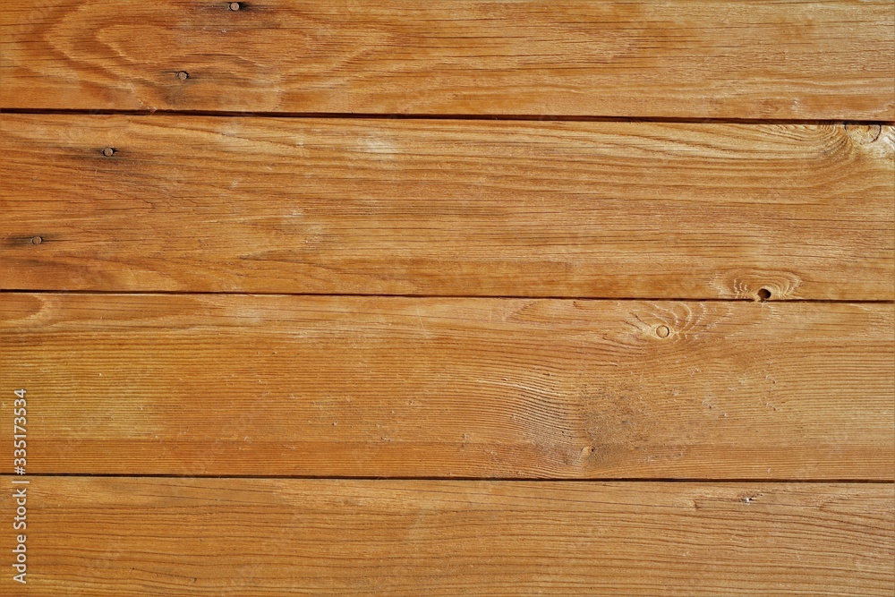 texture of wood planks coated with glaze. color similar to chestnut, teak, walnut or oak. May be suitable for advertising protective wood coatings texture of wood planks coated with glaze. color similar to chestnut, teak, walnut or oak. May be suitable for advertising protective wood coatings