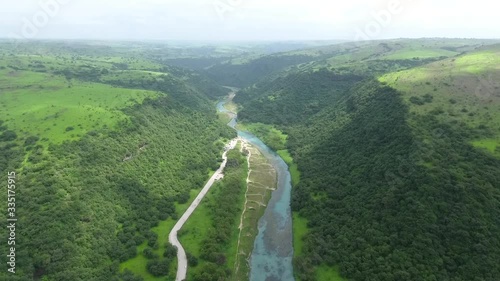 A surprising snapshot of the drone in the fall in Salalah, Ain Darbat, Sultanate of Oman 