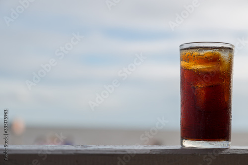 Cola with ice in the glass ready to drink for refresh
