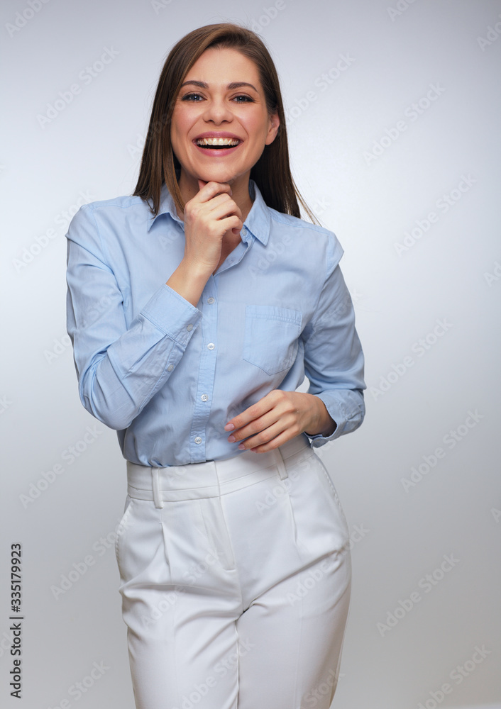 Beautiful laughing woman in white pants and blue shirt. Beautiful laughing woman in white pants and blue shirt.