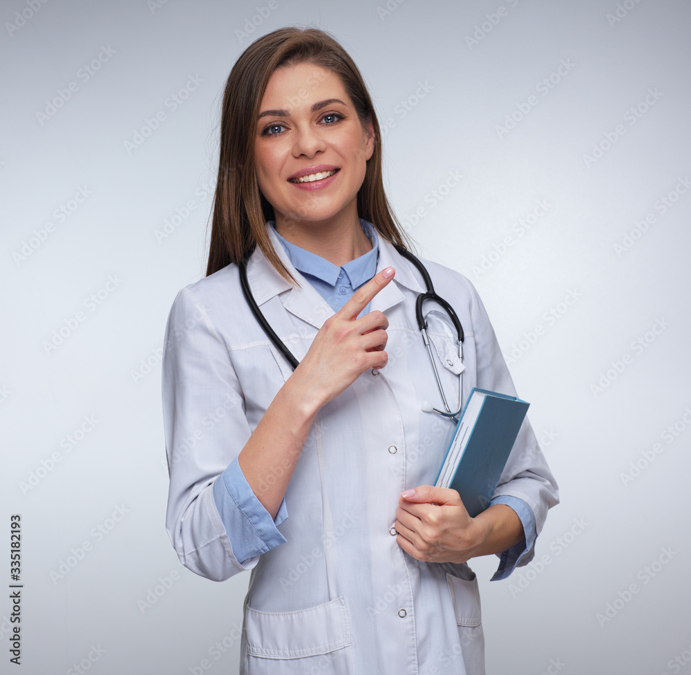 Woman medical student or doctor holding book Woman medical student or doctor holding book