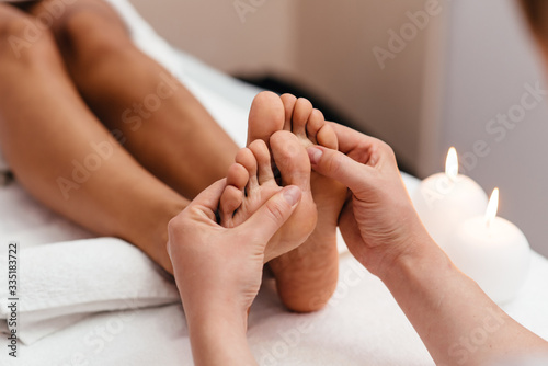 Pedicure and foot massage.Woman in a beauty salon for pedicure and foot massage.