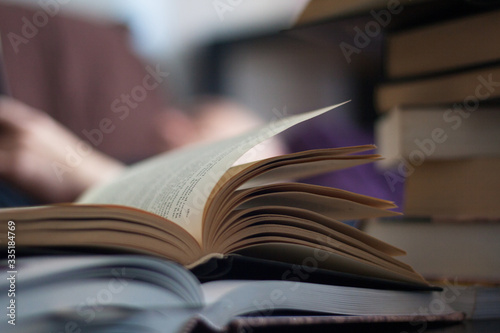 Coronavirus. Man reading in times of quarantine. Man locked up at home spends the afternoon reading.