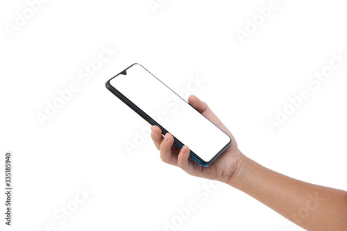 Smartphone Mock up, Asian girl Hand holding mobile phone and using touching screen isolated on white background, selective focus and copy space.