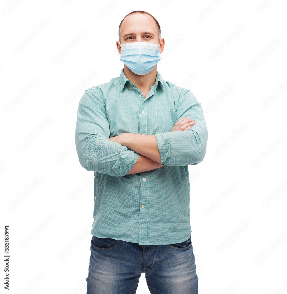 health, quarantine and pandemic concept - young man wearing protective medical mask for protection from virus disease over grey background health, quarantine and pandemic concept - young man wearing protective medical mask for protection from virus disease over grey background