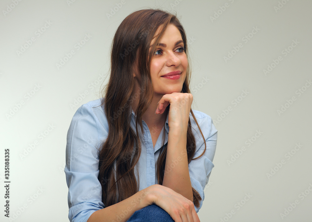 relaxed woman sitting and looking away. relaxed woman sitting and looking away.