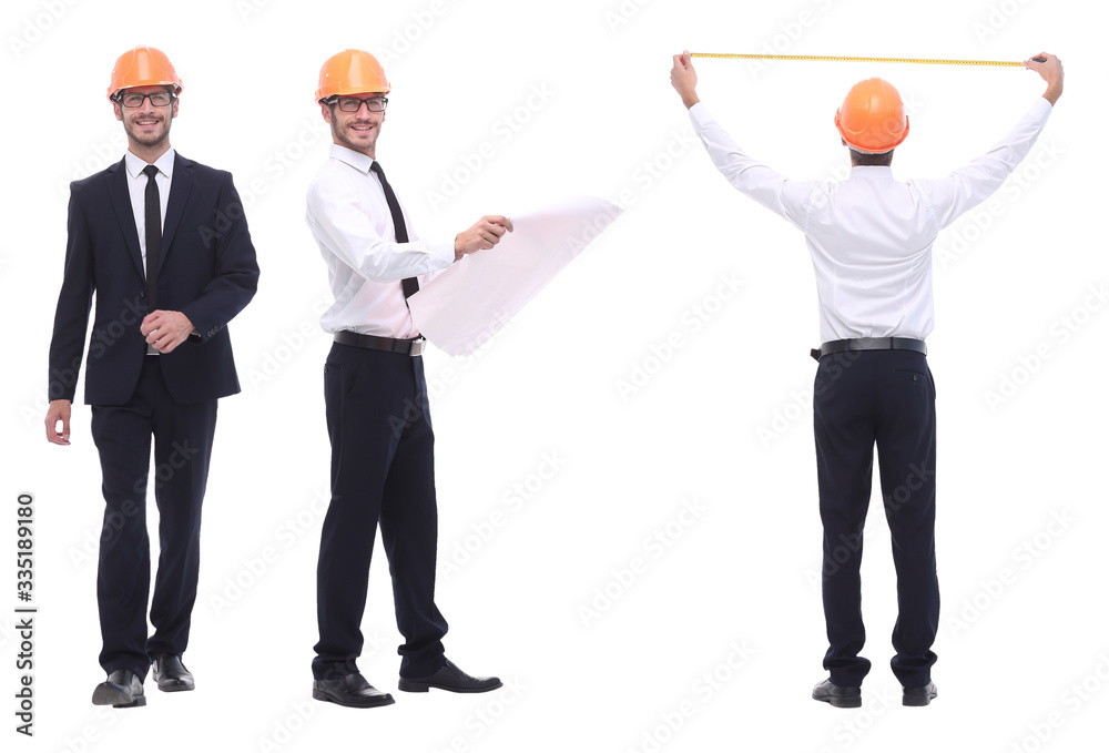 in full growth .a qualified architect in an orange helmet