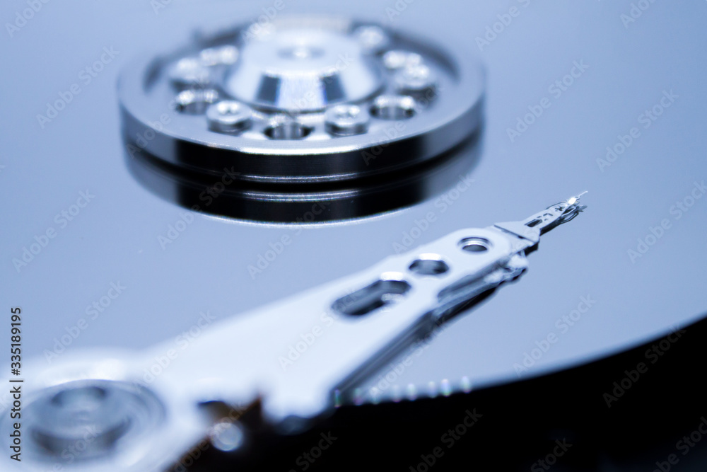 Close up of opened hard disk drive Close up of opened hard disk drive