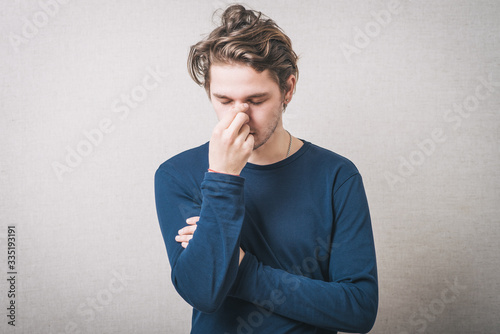 Worried man tries to remember something photo