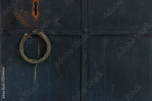 Obraz na plátně Close-up of the old iron black door