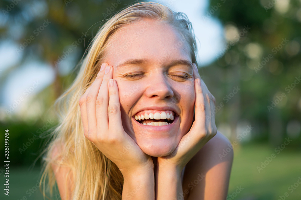 A woman smiling and laughing. Happy people. Portrait. A woman smiling and laughing. Happy people. Portrait.