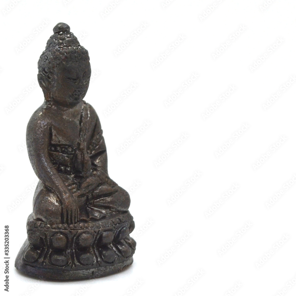 small buddha image used as amulets pendant,thai monk amulet on white image background small buddha image used as amulets pendant,thai monk amulet on white image background