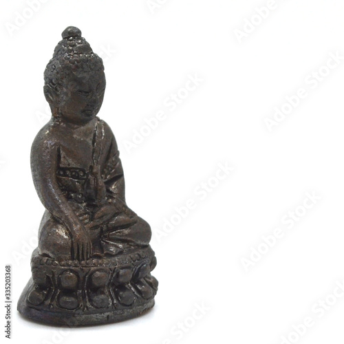 small buddha image used as amulets pendant thai monk amulet on white image background