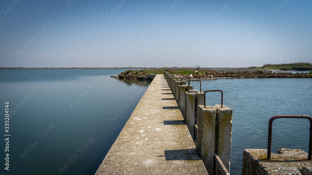 fish farm cement bridge path at wetland