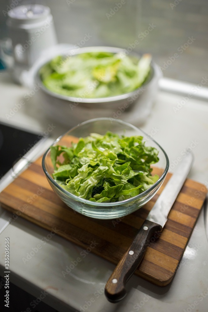 green salad in glass bowl isolated. green salad in glass bowl isolated.