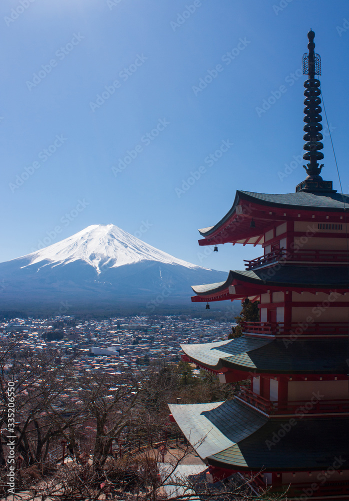 Chureito Pagoda in the Five Lakes Region and the highest mountain of Japan, Mt Fuji, in the distance