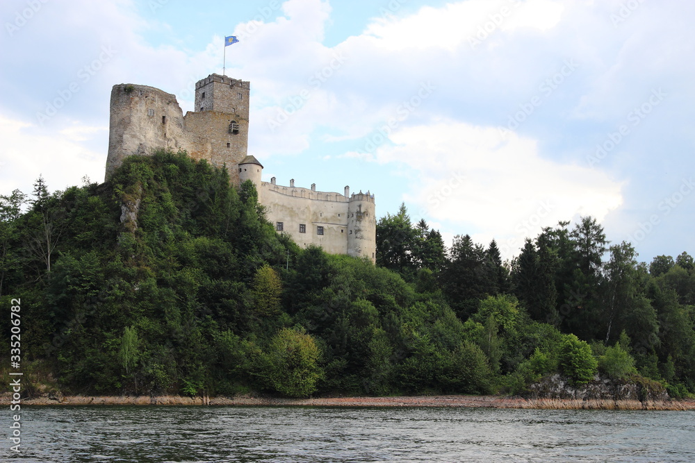 Fototapeta premium Castle on a rock by the lake