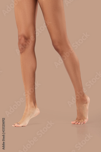 Bare legs of african girl model