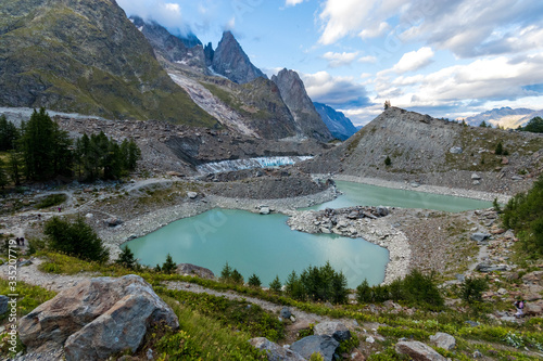 Fototapeta Naklejka Na Ścianę i Meble -  The Miage lake (Lac du Miage)  and Miage glacier at the foot of the Mont Blanc massif, in Val Veny. Italian alps, Aosta Valley, Italy
