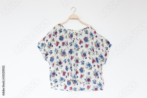 Woman blouse with summer blouse cotton on white background.