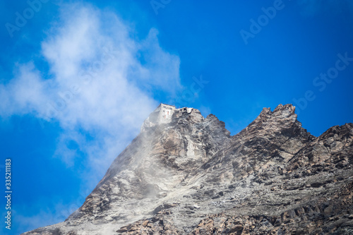 refuge on a peak of mountain immersed in clouds near Matterhorn (Cervino), Breuil-Cervinia, Aosta Valley, Italy