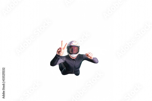Dynamic. Skydiver is in free fall. Parachutist uses professional equipment.Extreme people flying in open air.  Freedom as a way of life. 