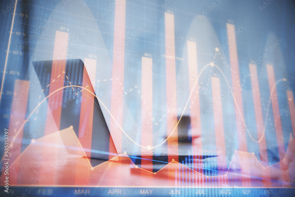 Double exposure of graph and financial info and work space with computer background. Concept of international online trading. Double exposure of graph and financial info and work space with computer background. Concept of international online trading.