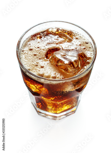 top view of glass of cola with ice cubes isolated on white background