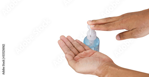 Female hand pressing bottle and pouring alcohol-based sanitize on hands. Liquid soap with pumping from bottle. Applying a moisturizing sanitize. Female washing hands.