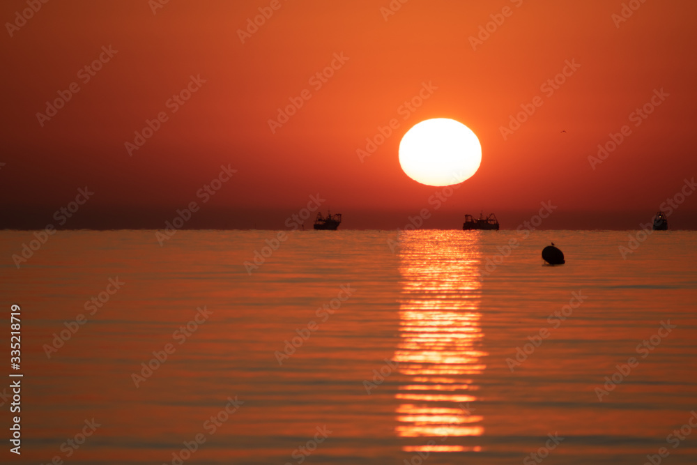 Beautiful sunrise from the Riccione coast.  Riccione, la costa adriatica ne mar mediterraneo.