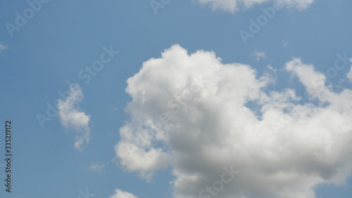 Cumulus cloud on beautiful blue sky   Fluffy clouds formations at tropical zone 