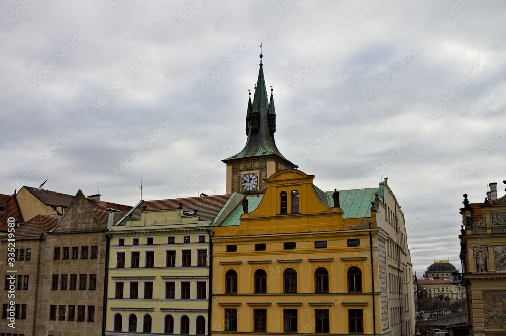 Fototapeta premium Old bohemian buildings with decorated roofs and spires (Prague, Czech Republic, Europe)