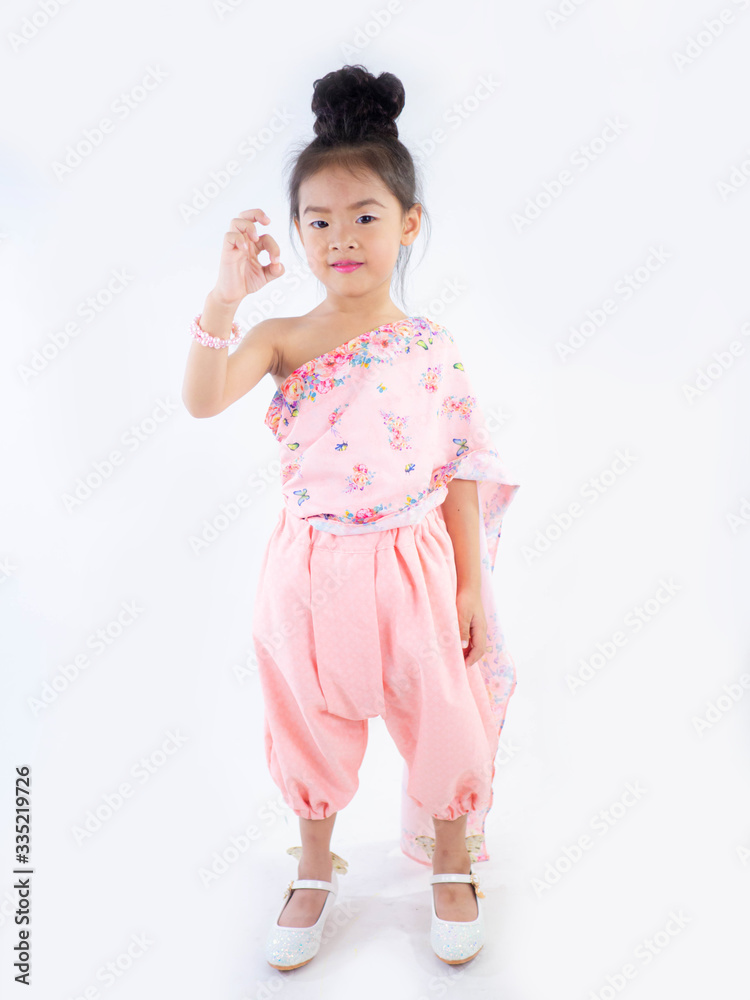 children girl in traditional Thai dress for Welcome Songkran Festival on white background children girl in traditional Thai dress for Welcome Songkran Festival on white background