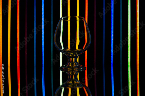 Glasses on a beautiful neon background 
 
photo taken at home, in the reflection of the monitor screen and mirror, spring 2020, neon, glasses, mirror 