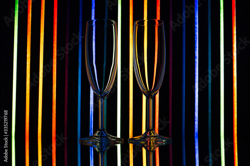 Glasses on a beautiful neon background 
 
photo taken at home, in the reflection of the monitor screen and mirror, spring 2020, neon, glasses, mirror 