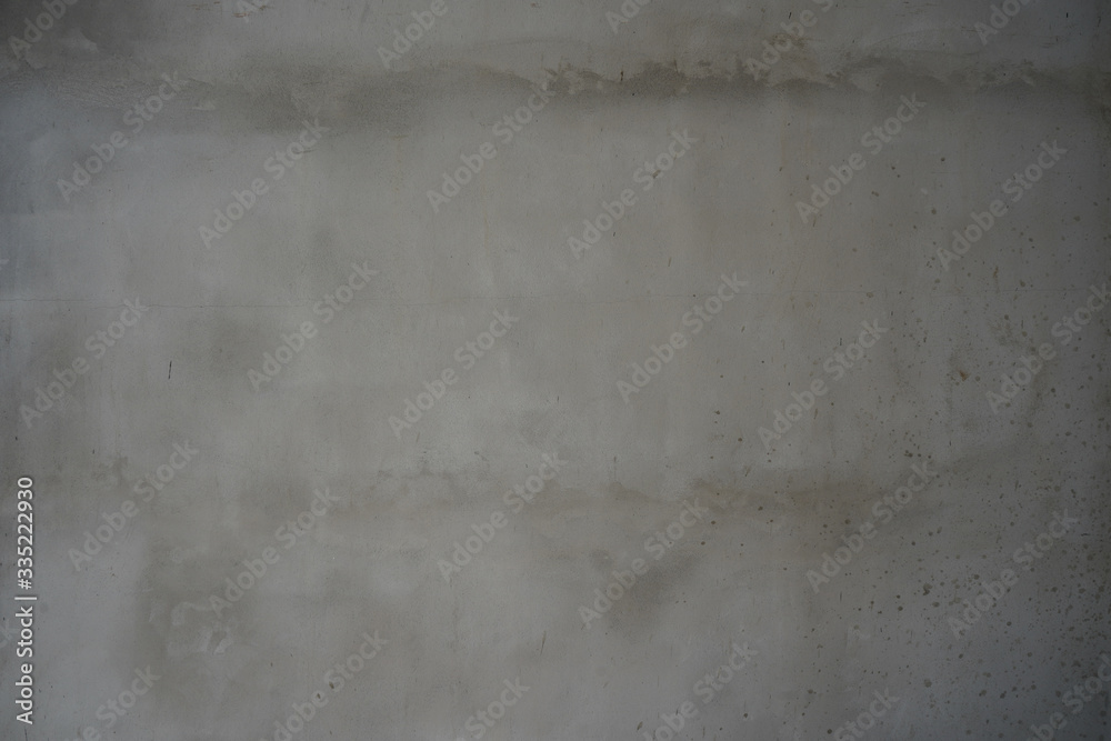 Old grey cement wall with grunge surface for background, textures, building, renovation and objects.  