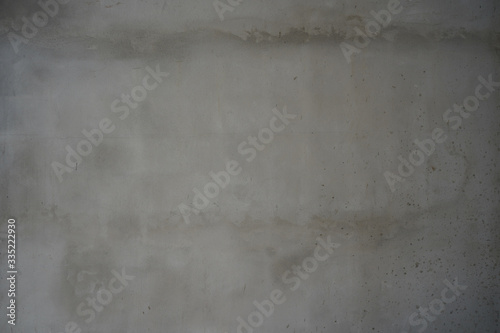 Old grey cement wall with grunge surface for background, textures, building, renovation and objects. 