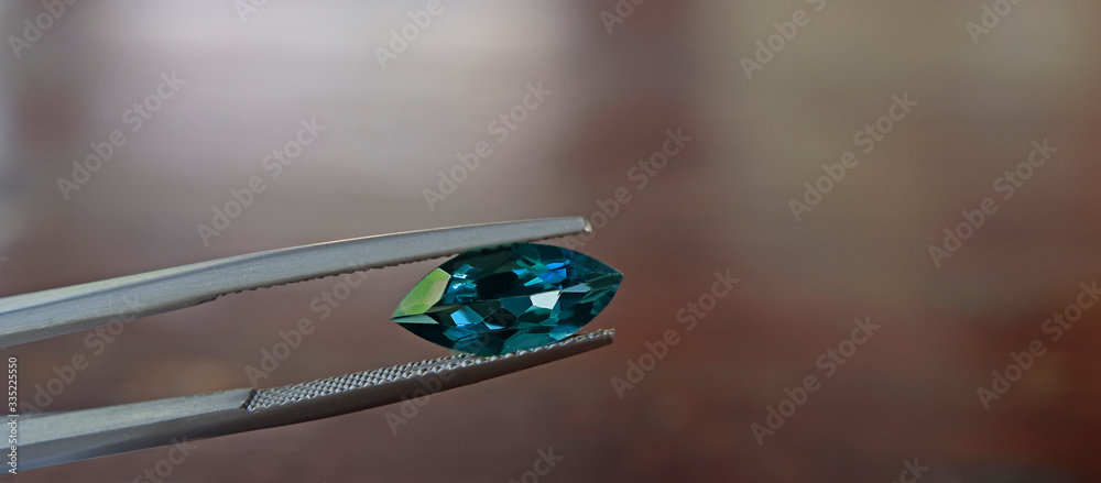 Blue sapphire Gemstone Expensive blue in a tong Blue sapphire Gemstone Expensive blue in a tong