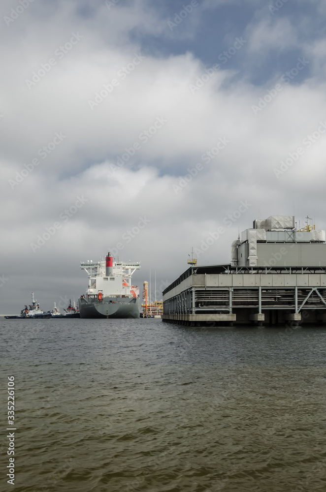 LNG TANKER - Ship at the gas unloading terminal LNG TANKER - Ship at the gas unloading terminal