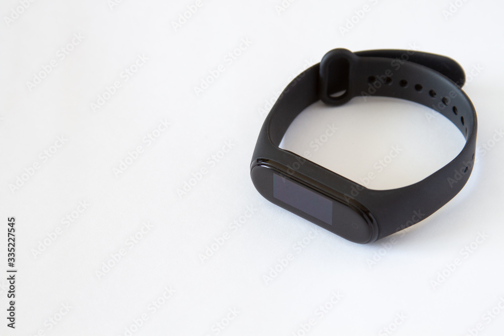 smart watch with a black bracelet on a white background. copyspace for text. smart watch with a black bracelet on a white background. copyspace for text.