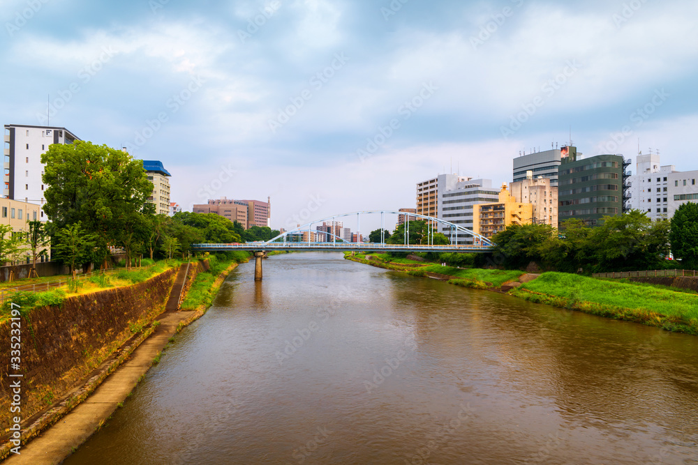 View of a bridge over the Shirakawa river in Kumamoto, Japan