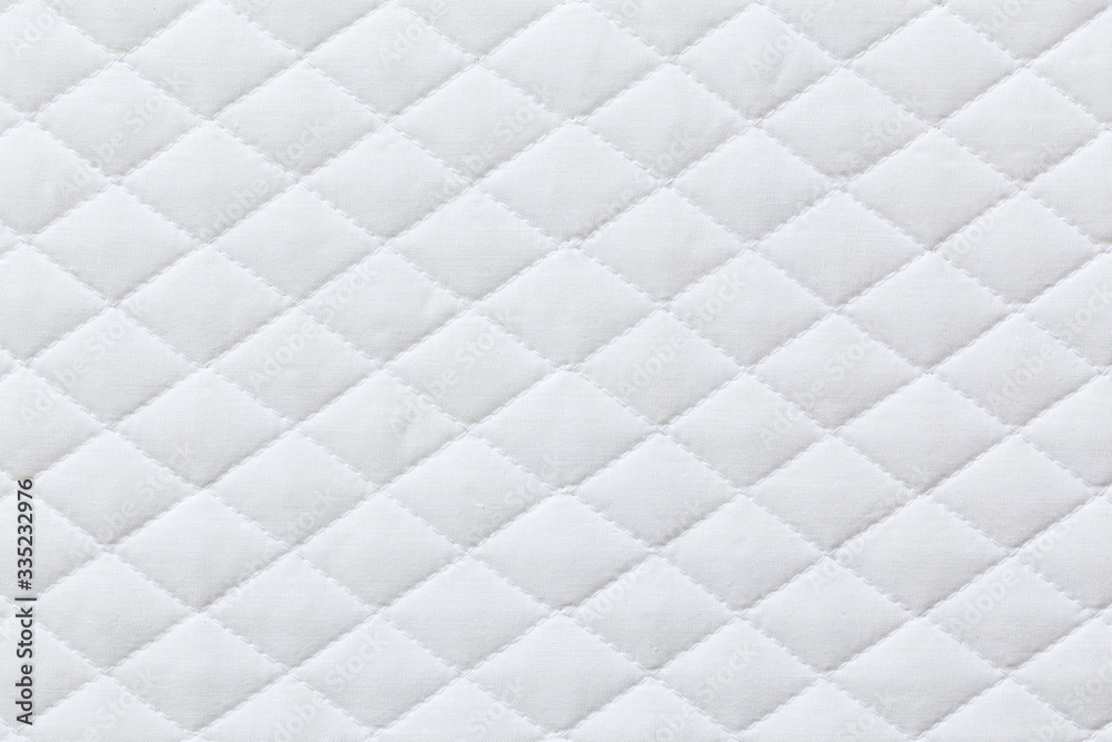 white mattress bedding pattern background. backdrop surface for design art work. white mattress bedding pattern background. backdrop surface for design art work.