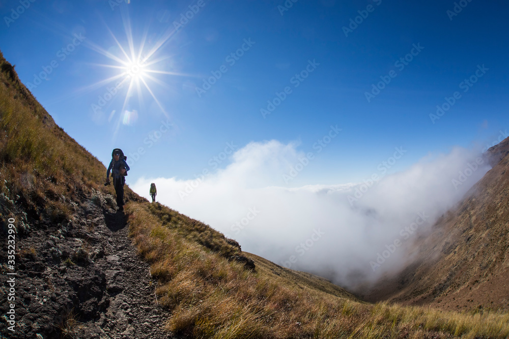 man on the top of mountain, Drakensberg South Africa