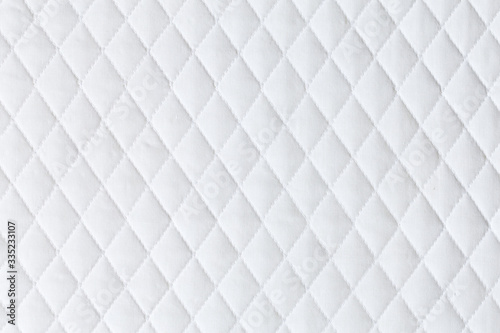 white mattress bedding pattern background. backdrop surface for design art work.