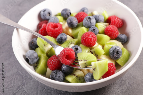 mixed fruit salad with blueberry, raspberry, kiwi and banana
