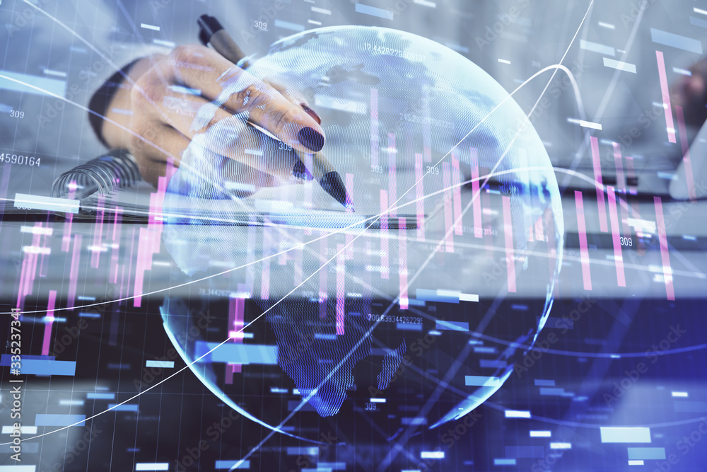 Double exposure of woman's hands making notes with forex graph hologram. Concept technical analysis. Double exposure of woman's hands making notes with forex graph hologram. Concept technical analysis.