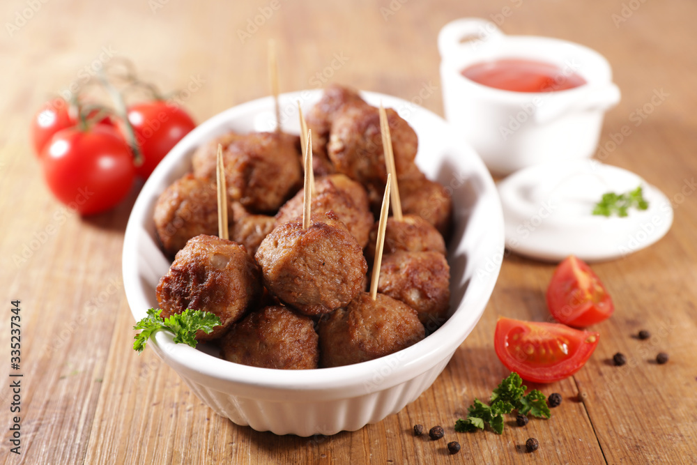 fried meatball with tomato sauce fried meatball with tomato sauce