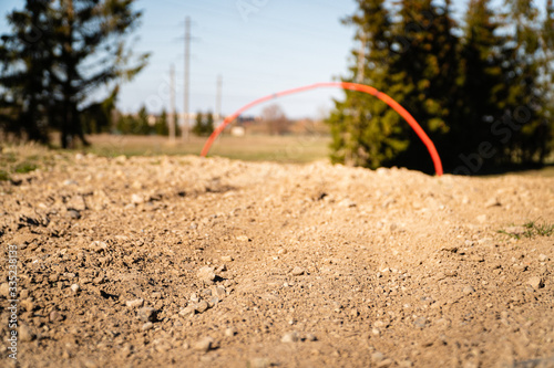 Low angle of empty motocross track with trees in background - Corona virus outbreak stops activities photo