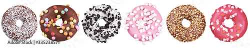 set of donuts with colored sprinkles isolated on white. top view