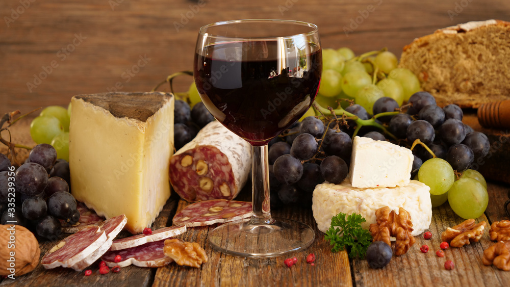 red wine with cheese, salami and bread